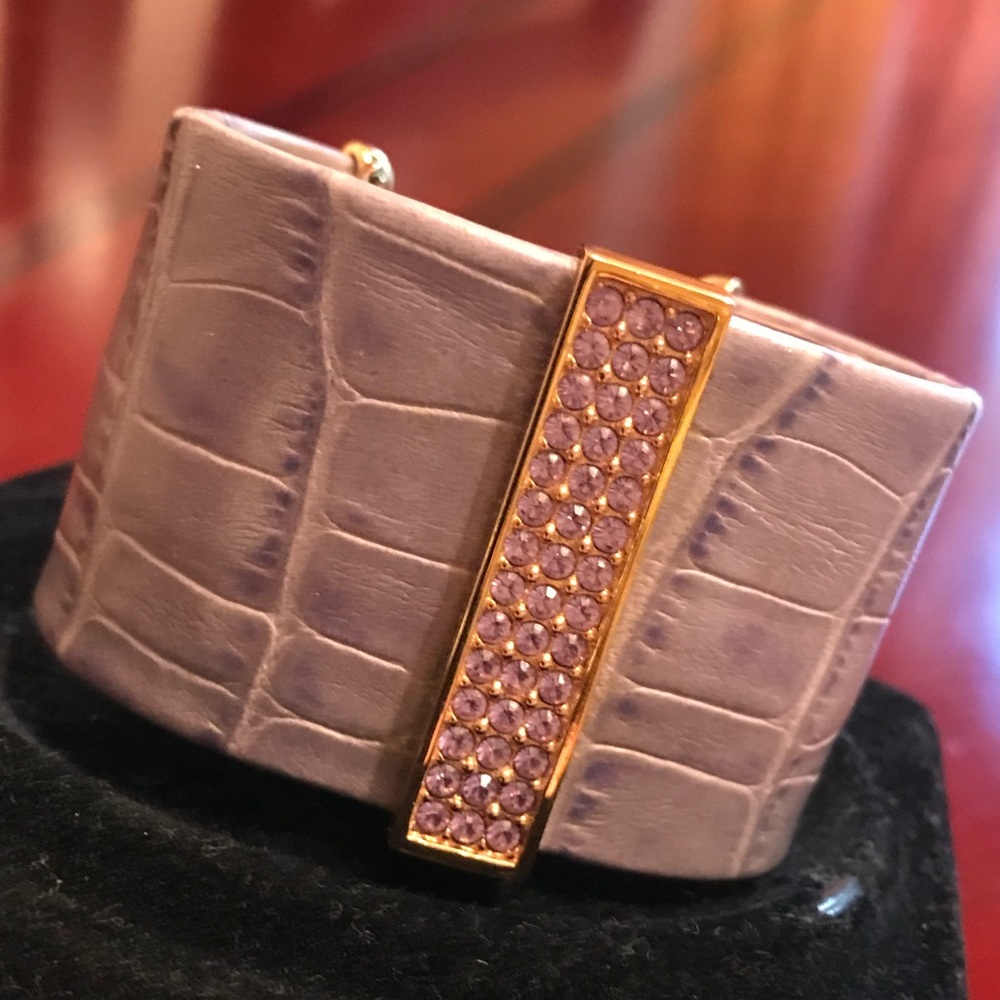 Swarovski cuff bracelet in lilac leather w/lilac crystals in gold tone setting.